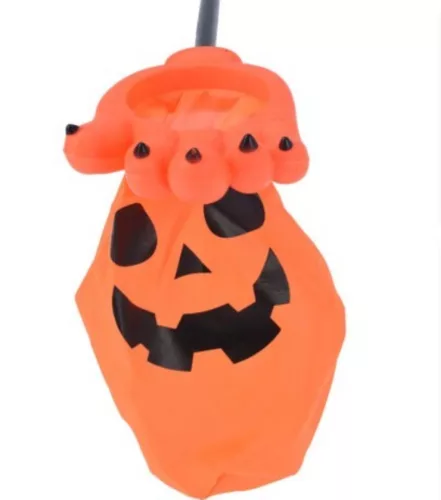 Halloween -Cukorka tartó kéz narancssárga